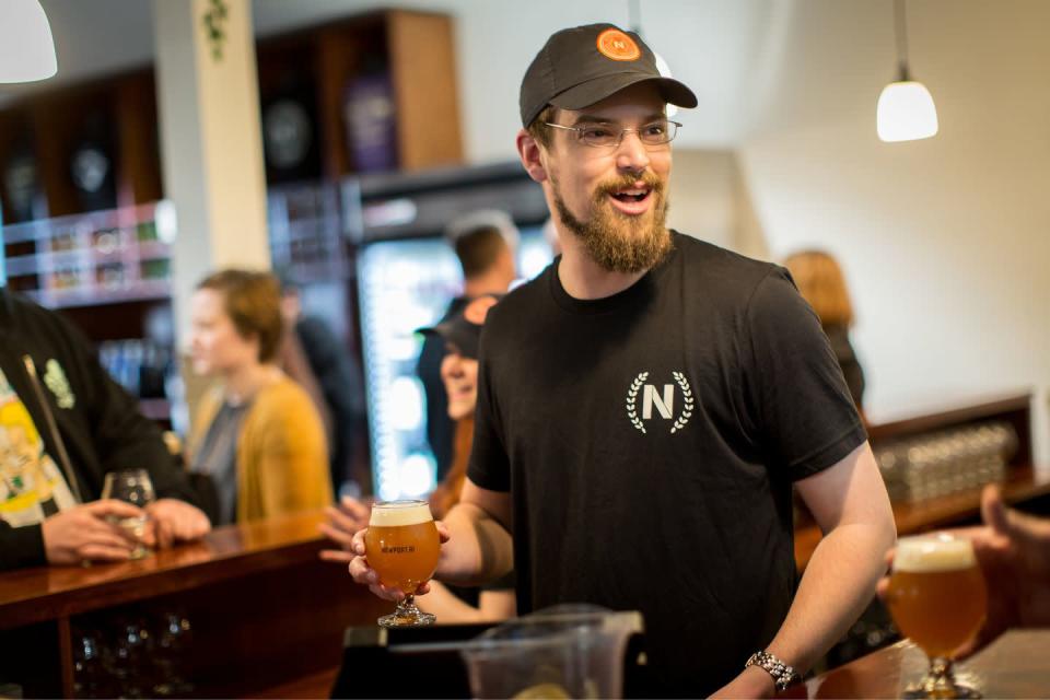 <p><a href="https://newportcraft.com" rel="nofollow noopener" target="_blank" data-ylk="slk:Newport Craft Brewing & Distilling Company" class="link ">Newport Craft Brewing & Distilling Company</a> was founded in 1999 by four college friends. Today, the brewery serves more than 10 beers on tap at its tasting room. Guests can also sample spirits from the distillery side of the operation, including Thomas Tew Rum, the official rum of the New York Mets. </p>