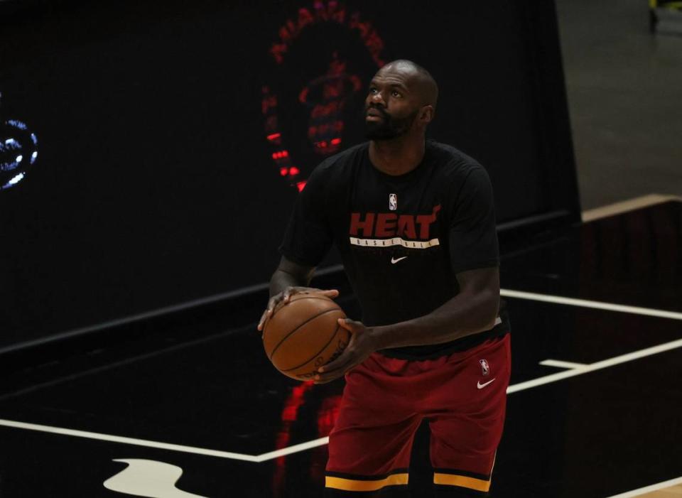 Miami Heat center Dewayne Dedmon (21) practices before the start of their game against the Brooklyn Nets at AmericanAirlines Arena on Sunday, April 18, 2021 in Miami.