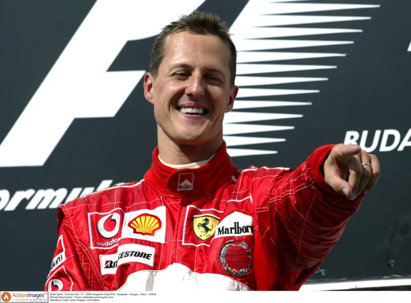 FILE PHOTO: Michael Schumacher - Ferrari celebrates winnning the race