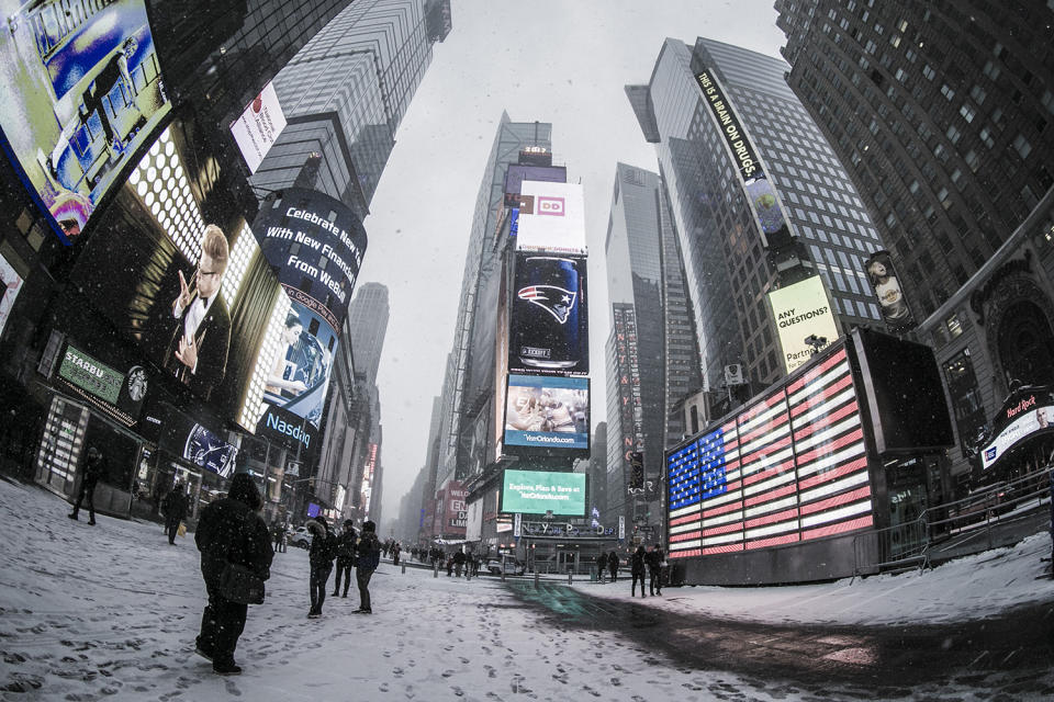 Snow falls in Times Square