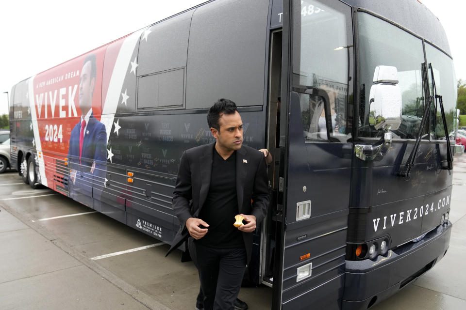 FILE - Republican presidential candidate Vivek Ramaswamy steps off his bus after arriving at a campaign rally, Thursday, May 11, 2023, in Urbandale, Iowa. (AP Photo/Charlie Neibergall, File)