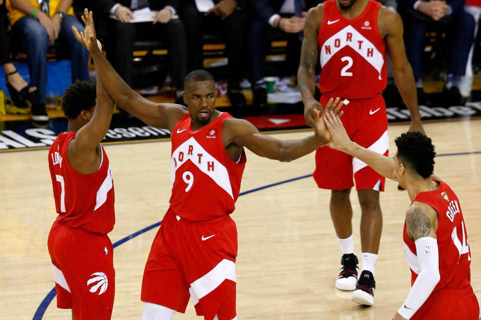 OAKLAND, CALIFORNIA - JUNE 07:  Serge Ibaka #9 of the Toronto Raptors celebrates the basket against the against the Golden State Warriors during Game Four of the 2019 NBA Finals at ORACLE Arena on June 07, 2019 in Oakland, California. NOTE TO USER: User expressly acknowledges and agrees that, by downloading and or using this photograph, User is consenting to the terms and conditions of the Getty Images License Agreement. (Photo by Lachlan Cunningham/Getty Images)