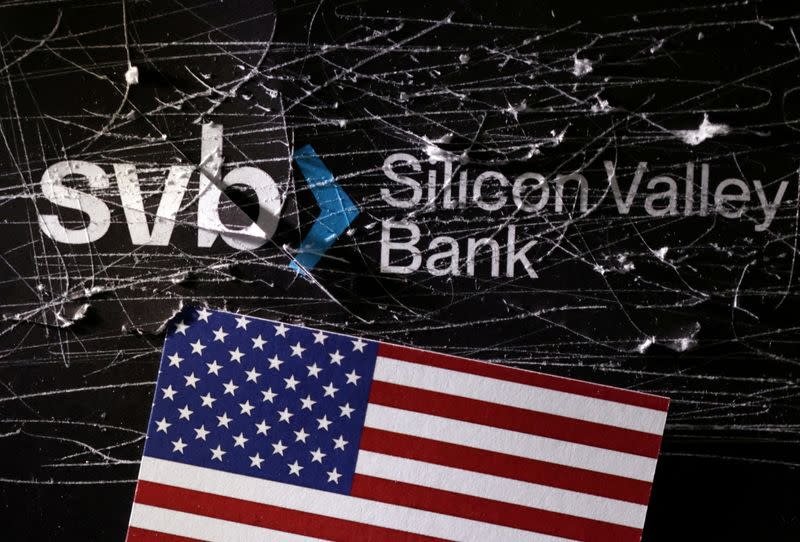 FILE PHOTO: Illustration shows destroyed SVB (Silicon Valley Bank) logo and U.S. flag