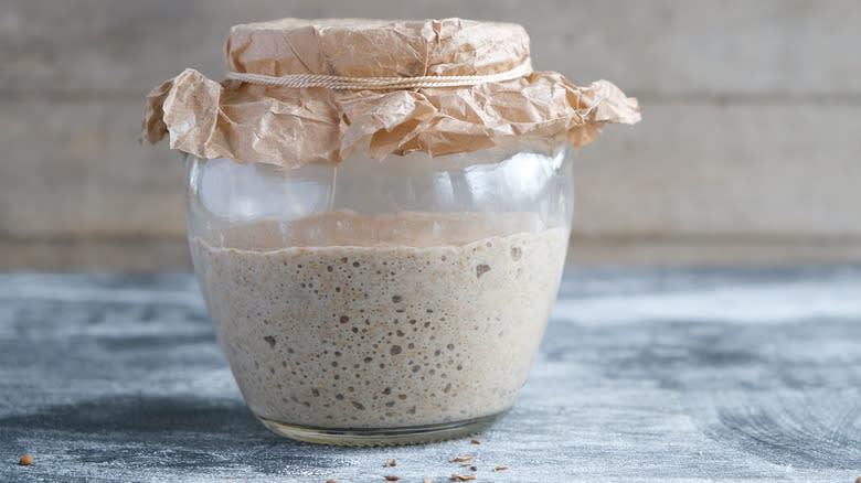 sourdough starter in rustic jar