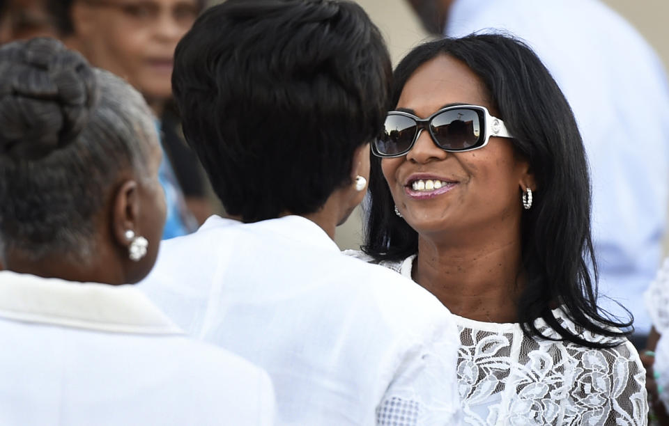 Deanna Brown Thomas, daughter of singer James Brown, greets Alpha Kappa Alpha sorority members outside Mt. Calvary Baptist Church before going in for the viewing of opera star Jessye Norman in Augusta, Ga., Thursday, Oct. 10, 2019. (Michael Holahan/The Augusta Chronicle via AP)