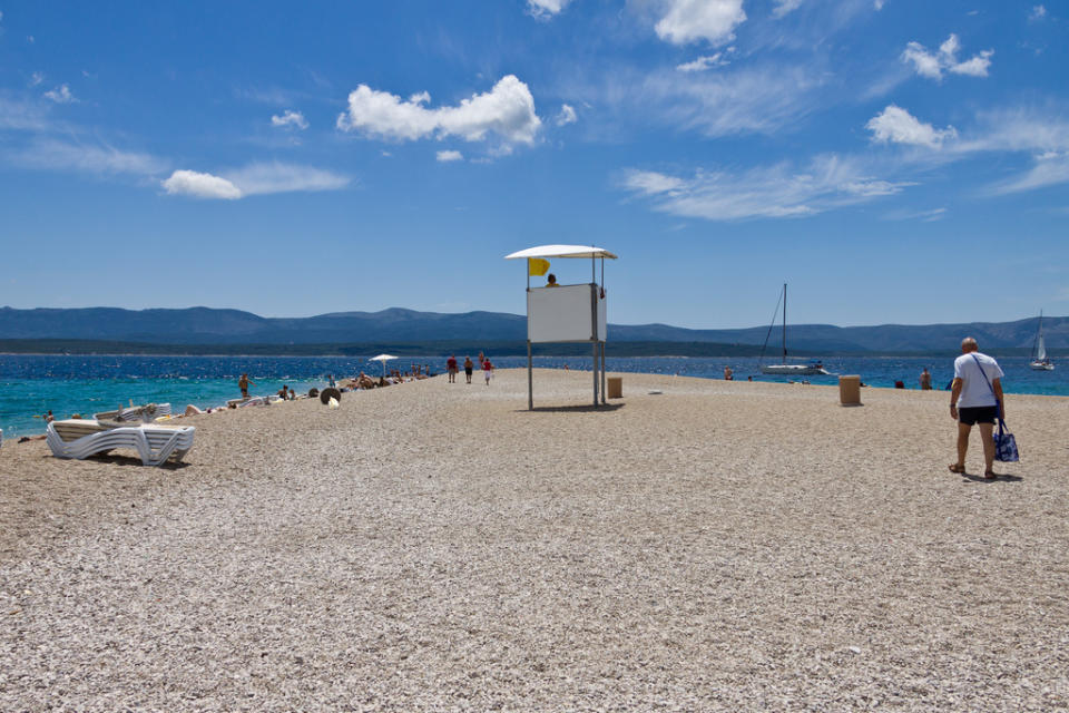 <p>No. 5 Most Affordable Beaches: Croatia<br> Sunscreen: $4.77<br> Water: $1.28<br> Beer: $2.31<br> Ice Cream: $2.89<br> Lunch: $9.19<br><b>Total: $20.44</b><br> (Photo: Zlatni Rat in Brac Island, Croatia/Nikolaj Potanin/<span>Flickr</span>) </p>