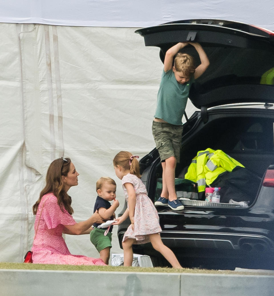 Catherine, Duchess of Cambridge, pictured playing with Prince Louis, Prince George and Princess Charlotte 