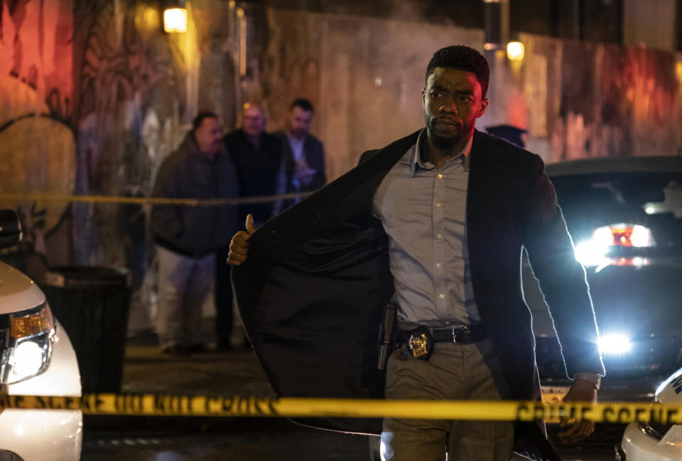 This image released by STXfilms shows Chadwick Boseman in a scene from "21 Bridges," in theaters on Nov. 22. (Matt Kennedy/STXfilms via AP)