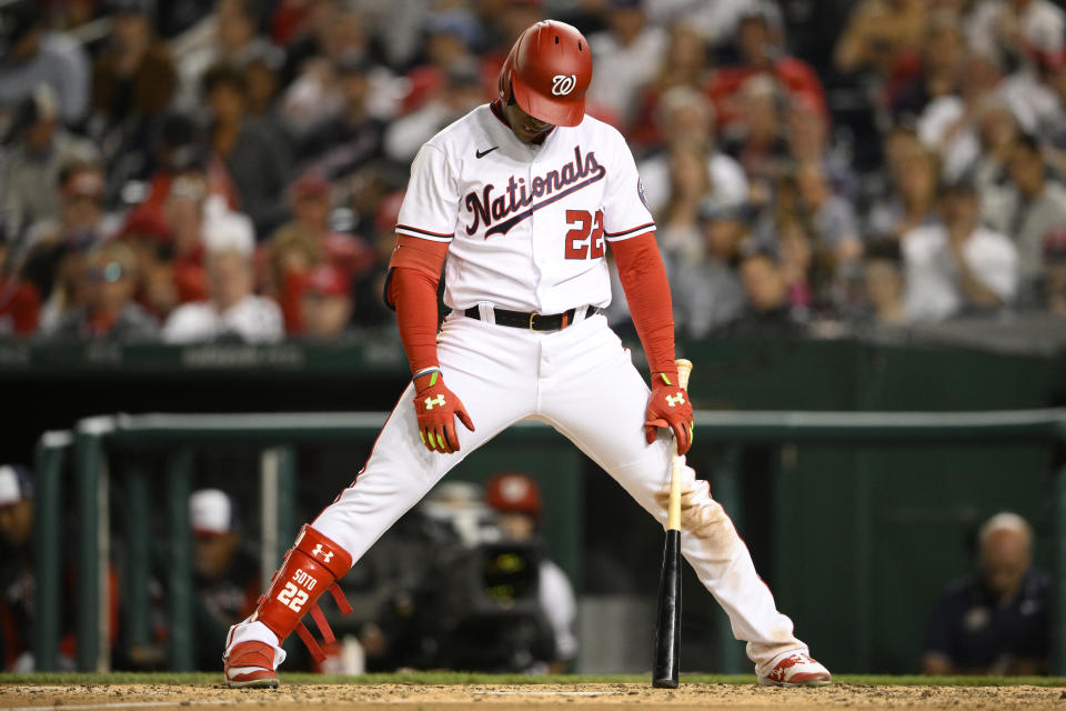 Washington Nationals' Juan Soto reacts after he struck out during the sixth inning of the team's baseball game against the San Francisco Giants, Friday, April 22, 2022, in Washington. The Giants won 7-1. (AP Photo/Nick Wass)