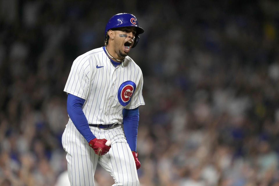 Chicago Cubs' Christopher Morel celebrates his three-run home run off San Francisco Giants relief pitcher Luke Jackson during the seventh inning of a baseball game Tuesday, Sept. 5, 2023, in Chicago. Yan Gomes and Nick Madrigal also scored on the play. (AP Photo/Charles Rex Arbogast)
