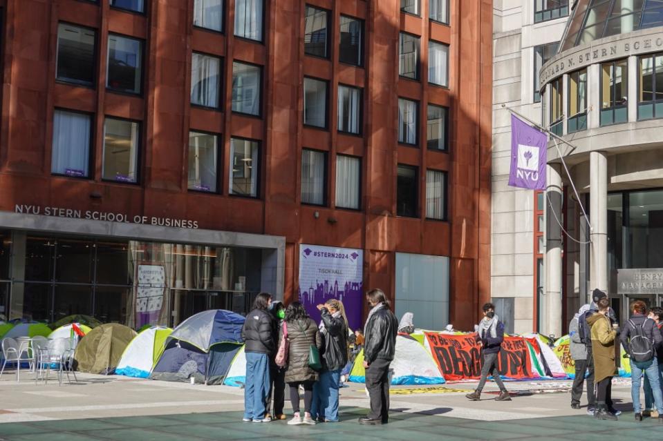 Dozens of tents were seen being set up in front of the business school on Monday. LP Media