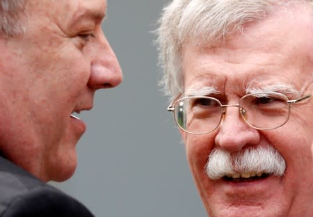 FILE PHOTO: U.S. Secretary of State Pompeo talks with national security adviser Bolton prior to a Abe-Trump joint news conference at the White House in Washington