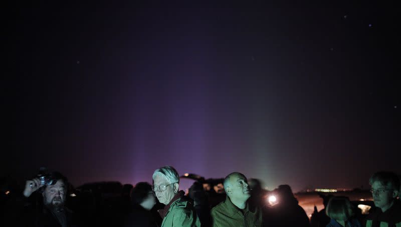 A group of attendees gather in a desert area for UFO sightings at the Annual International UFO Congress Convention Convention & Film Festival in Laughlin, Nev., Thursday, Feb. 26, 2009.
