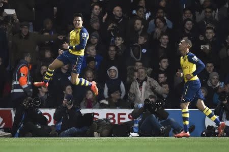 Football - Queens Park Rangers v Arsenal - Barclays Premier League - Loftus Road - 4/3/15 Arsenal's Alexis Sanchez celebrates scoring their second goal with Kieran Gibbs Reuters / Toby Melville Livepic