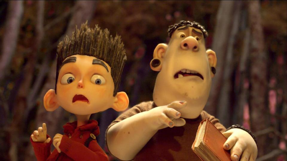 This film image released by Focus Features shows the character Norman, voiced by Kodi Smit-McPhee, left, and Alvin, voiced by Christopher Mintz-Plasse, in the 3D stop-motion film, "ParaNorman." (AP Photo/Focus Features)