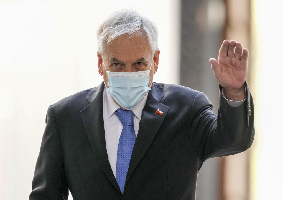 Chilean President Sebastian Piñera arrives at La Moneda presidential palace in Santiago, Chile, Monday, Nov. 8, 2021. (AP Photo/Esteban Felix)