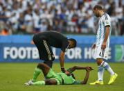 Talk about an unintentional hand ball. Nigeria's Michael Babatunde <a href="https://sports.yahoo.com/news/nigerias-babatunde-world-cup-192024989--sow.html" data-ylk="slk:sustained a broken wrist;elm:context_link;itc:0;sec:content-canvas;outcm:mb_qualified_link;_E:mb_qualified_link;ct:story;" class="link  yahoo-link">sustained a broken wrist</a> after his teammate Ogenyi Onazi belted a shot against the Argentinian goal and it hit Babatunde's arm. Onazi later joked, "I swear that was a sure goal if not for (his) hand." (Darren Staples/Reuters)