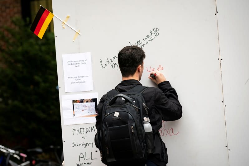 FILE PHOTO: Georgetown students erect a replica Berlin Wall for to mark the 30th anniversary of the fall of the Berlin Wall