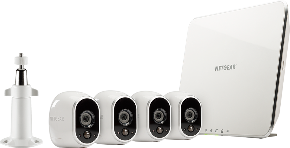 All the components of an Arlo security camera system lined up