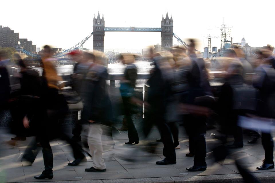 Pay  Commuters walk across London Bridge in the City of London Wednesday, Nov. 3, 2010, as subway workers went on strike for the third time in as many months, leaving the capital's residents snarled in a chaotic morning commute. Nearly every line on London's Underground subway network, which carries about 3 million passengers on a typical weekday, was either suspended or disrupted. Some 80 stations were closed, including the one at Heathrow Airport's Terminal 4. Commuters fought their way on to packed buses, biked or just walked to work. In the background is Tower Bridge. (AP Photo/Sang Tan)