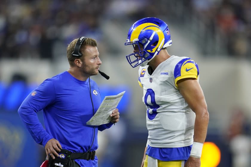 Rams coach Sean McVay talks with quarterback Matthew Stafford during the second half Sept. 12, 2021, in Inglewood, Calif.