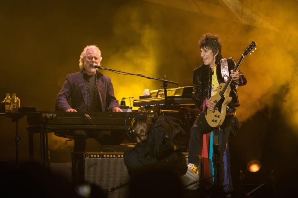 Chuck Leavell shares a moment with Ronnie Wood during a Rolling Stones concert.