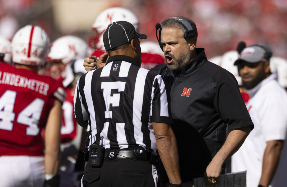 Nebraska head coach Matt Rhule, right, argues with a referee about ball placement following a Nebraska punt against Northwestern during the first half of an NCAA college football game Saturday, Oct. 21, 2023, in Lincoln, Neb. (AP Photo/Rebecca S. Gratz)