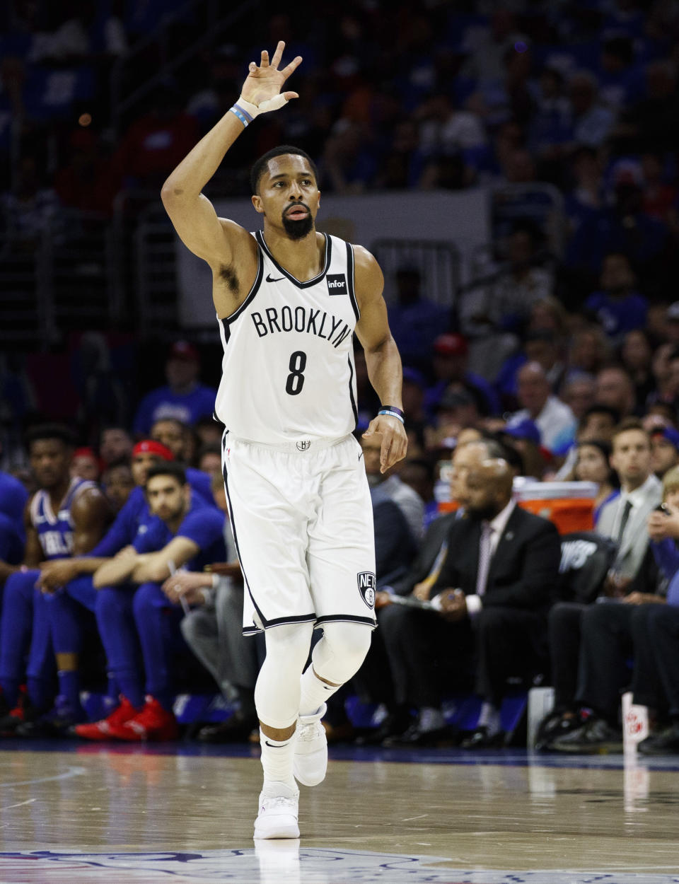 Brooklyn Nets' Spencer Dinwiddie reacts to his three-point basket during the first half in Game 1 of a first-round NBA basketball playoff series against the Philadelphia 76ers, Saturday, April 13, 2019, in Philadelphia. (AP Photo/Chris Szagola)