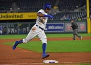 Aug 16, 2018; Kansas City, MO, USA; Kansas City Royals second baseman Rosell Herrera (7) rounds third and scores a run during the fourth inning against the Toronto Blue Jays at Kauffman Stadium. Peter G. Aiken/USA TODAY Sports