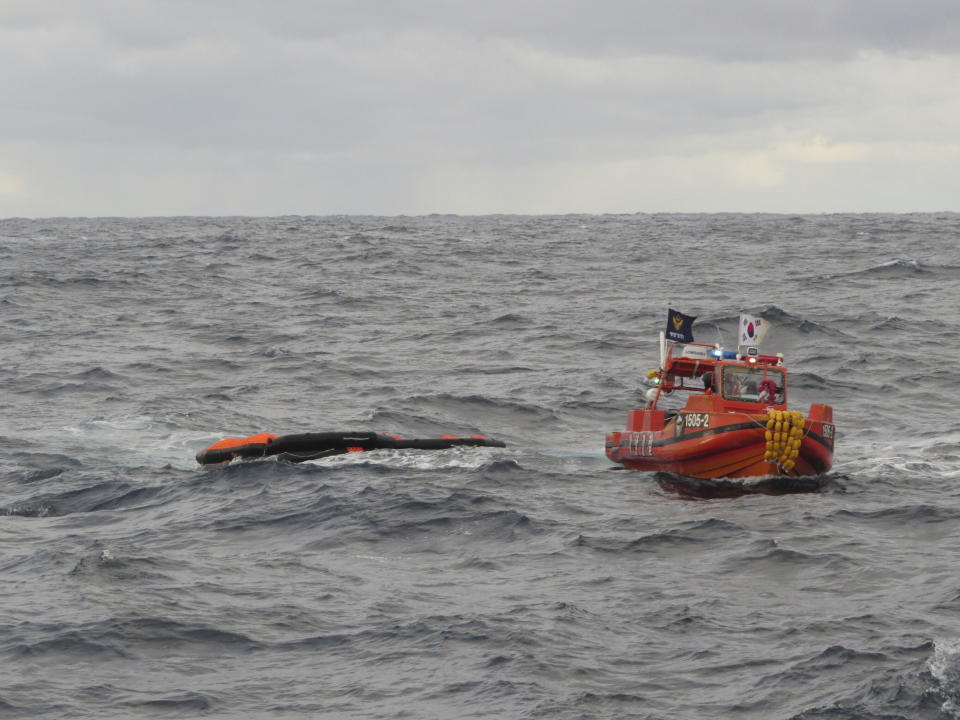 In this photo provided by the Korea Coast Guard, a South Korea coast guard vessel conducts a search operation in waters between South Korea and Japan, Wednesday, Jan. 25, 2023. South Korean and Japanese coast guards were searching for crew members of a cargo ship that sank early Wednesday in waters between South Korea and Japan, South Korean officials said Wednesday. (The Korea Coast Guard via AP)