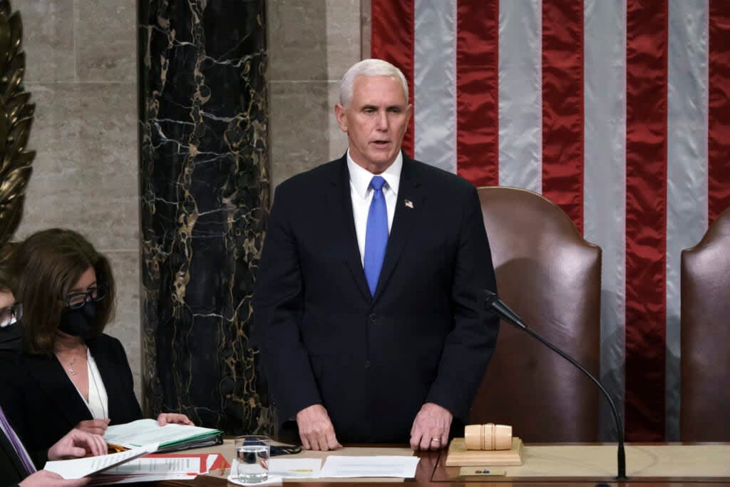 Former Vice President Mike Pence listens after reading the final certification of Electoral College votes cast in November’s presidential election during a joint session of Congress after working through the night, at the Capitol in Washington, Thursday, Jan. 7, 2021. (AP Photo/J. Scott Applewhite, Pool)