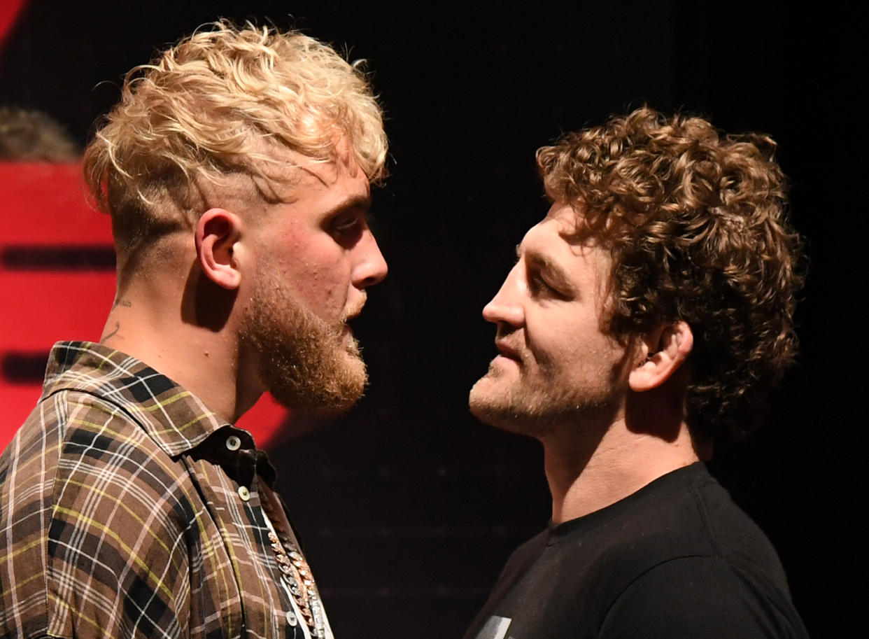 LAS VEGAS, NEVADA - MARCH 26:  Jake Paul (L) and Ben Askren face off during a news conference for Triller Fight Club's inaugural 2021 boxing event at The Venetian Las Vegas on March 26, 2021 in Las Vegas, Nevada. Paul and Askren will face each other in the main event that will take place on April 17, 2021, at Mercedes-Benz Stadium in Atlanta.  (Photo by Ethan Miller/Getty Images)