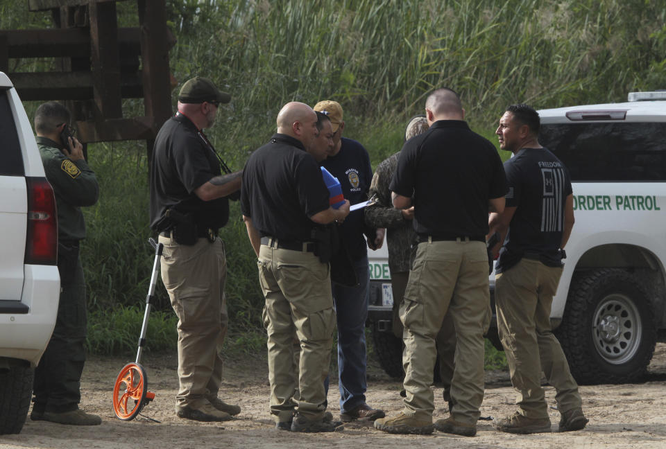 Border patrol agents on the scene where a McAllen-based Border Patrol agent died early Wednesday morning following a crash involving an all-terrain vehicle on Wednesday Dec. 7, 2022 in Mission, Texas. (Delcia Lopez/The Monitor via AP)