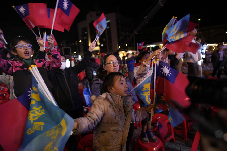 Kuomintang (KMT) party supporters react after their presidential candidate Hou Yu-ih conceded defeat in New Taipei City, Taiwan, Saturday, Jan. 13, 2024. In his concession speech, Hou apologized for "not working hard enough" to regain power for the KMT, which ran Taiwan under martial law for nearly four decades before democratic reforms in the 1980s. (AP Photo/Ng Han Guan)