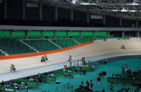 Cycling - 2016 Rio Olympics Test Event - Olympic Velodrome - Rio de Janeiro, Brazil - 26/6/2016 - Riders warm up during media visit. REUTERS/Sergio Moraes