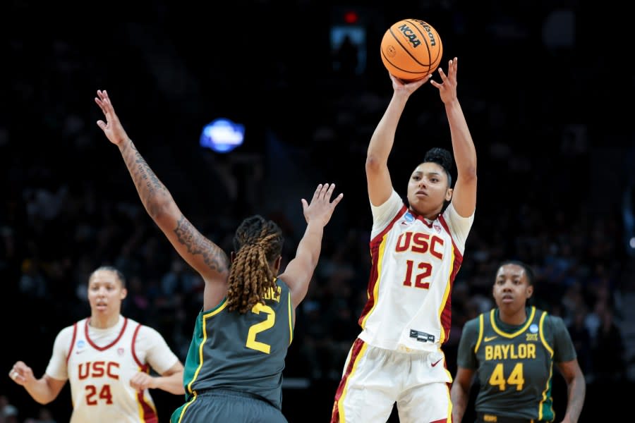 PORTLAND, OREGON – MARCH 30: JuJu Watkins #12 of the USC Trojans shoots over Yaya Felder #2 of the Baylor Lady Bears during the first half in the Sweet 16 round of the NCAA Women’s Basketball Tournament at Moda Center on March 30, 2024 in Portland, Oregon. (Photo by Steph Chambers/Getty Images)