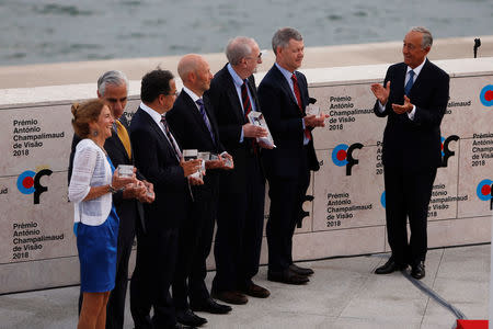 Jean Bennett, Alfred M. Maguire, Robin Ali, James Bainbridge, Samuel G. Jacobson, T. Michael Redmond and Portugal's President Marcelo Rebelo de Sousa during the 2018 Antonio Champalimaud Vision Awards ceremony at Champalimaud Foundation in Lisbon, Portugal September 4, 2018. REUTERS/Pedro Nunes