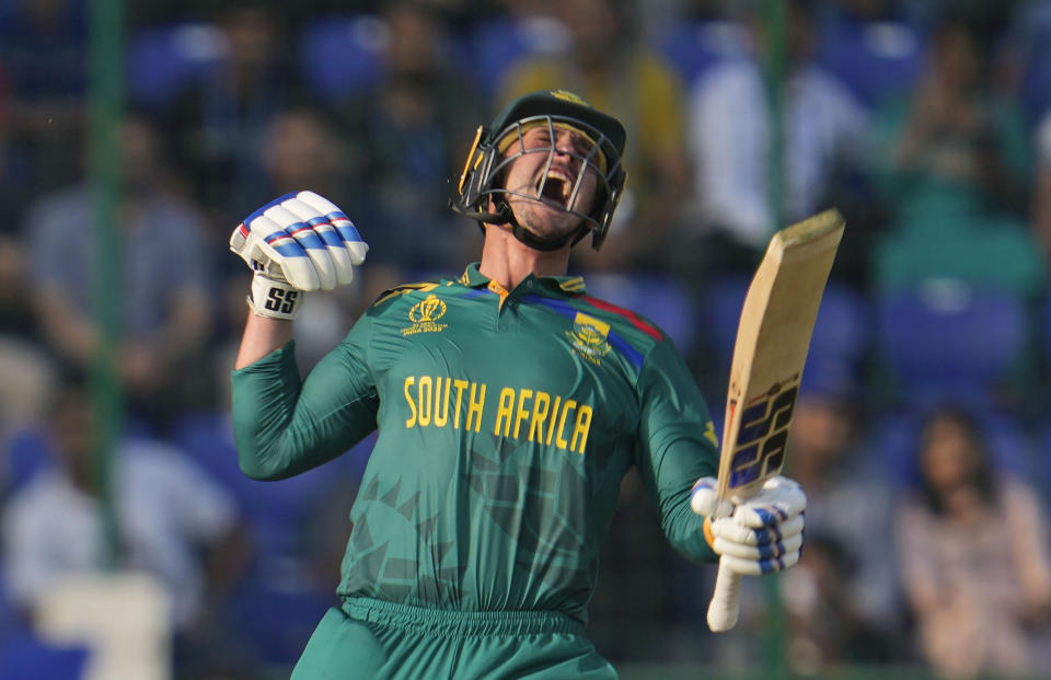 South Africa's Quinton De Kock celebrates after scoring a century during the ICC Cricket World Cup match between South Africa and Sri Lanka in New Delhi, India, Saturday, Oct. 7, 2023. (AP Photo/Altaf Qadri )