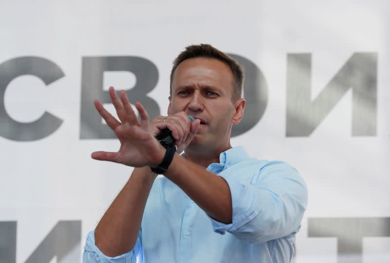 FILE PHOTO: Russian opposition leader Alexei Navalny addresses demonstrators during a rally in Moscow