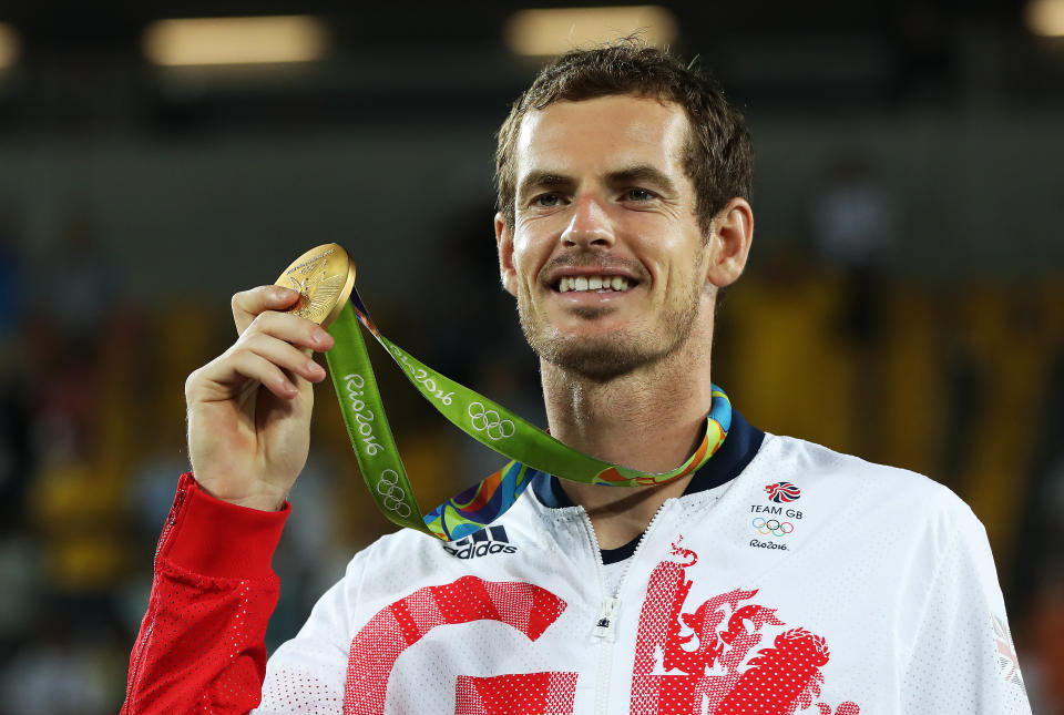 RIO DE JANEIRO, BRAZIL - AUGUST 14:  Andy Murray of Great Britain poses with his Gold medal after defeating Juan Martin del Potro of Argentina in the Men's singles final at Olympic Tennis Centre on August 14, 2016 in Rio de Janeiro, Brazil. (Photo by Ian MacNicol/Getty Images)