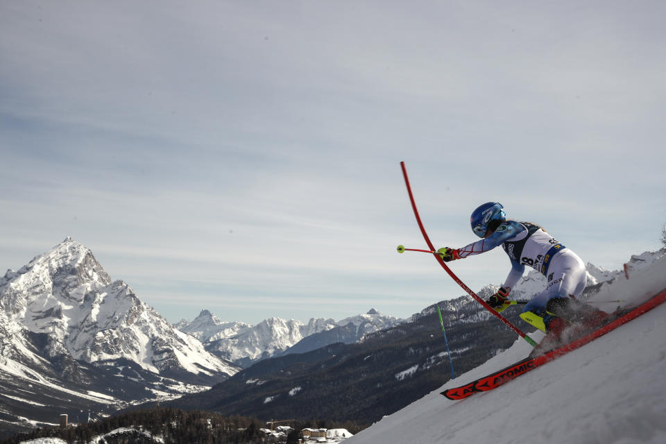 FILE - United States' Mikaela Shiffrin competes during the slalom portion of the women's combined race, at the alpine ski World Championships, in Cortina d'Ampezzo, Italy, Feb. 15, 2021. Olympic athletes in Alpine skiing and other outdoor sports dependent on snow are worried as they see winters disappearing. “I’m worried about my sport’s future but, really way beyond that, just worried about our all our futures and how much time we have before it all truly catches up with us,” Shiffrin said. (AP Photo/Gabriele Facciotti, File)