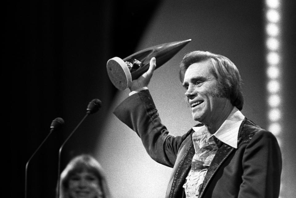 George Jones accepts his award for Male Vocalist of the Year during the 1981 CMA Awards. Jones also won the honor in 1980.