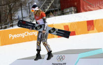 Freestyle Skiing - Pyeongchang 2018 Winter Olympics - Women's Parallel Giant Slalom Finals - Phoenix Snow Park - Pyeongchang, South Korea - February 24, 2018 - Gold medallist Ester Ledecka Of Czech Republic celebrates during flower ceremony. REUTERS/Mike Blake