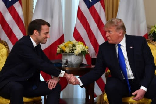 US President Donald Trump (R) met with French President Emmanuel Macron met before the NATO summit