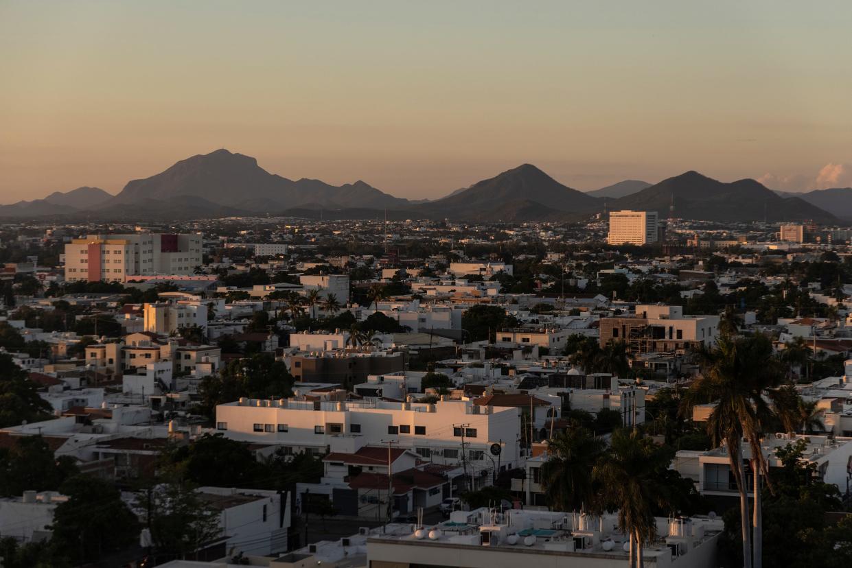The sun sets over Culiacán in the Mexican state of Sinaloa. The city is the home base of the Sinaloa Cartel. November 2023.