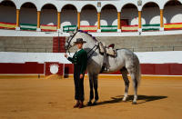 <p>French rejoneadora (mounted bullfighter who uses a lance) Lea Vincens, 33, poses at the Aracena bullring in Huelva, southern Spain, on February 25, 2018. (Photo: Cristina Quicler/AFP/Getty Images) </p>