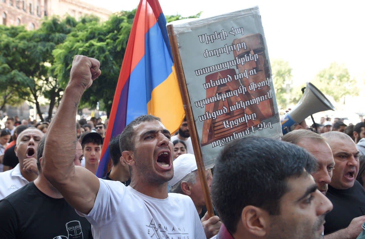 Protesters rallied in the Armenian capital of Yerevan for a third day on Thursday, demanding that authorities defend Armenians in Nagorno-Karabakh. (AFP via Getty Images)