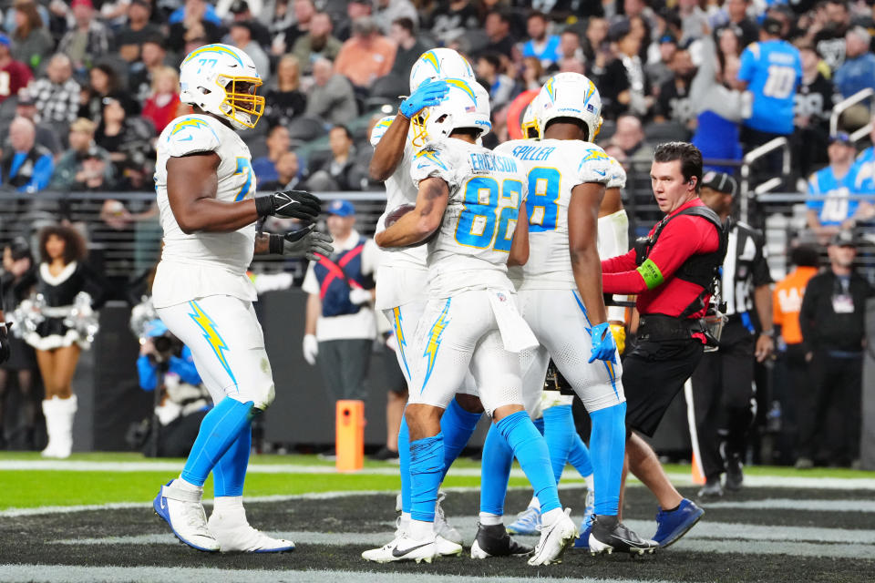 Dec 14, 2023; Paradise, Nevada, USA; Los Angeles Chargers wide receiver Alex Erickson (82) celebrates with teammates after scoring a touchdown in the fourth quarter against the <a class="link " href="https://sports.yahoo.com/nfl/teams/las-vegas/" data-i13n="sec:content-canvas;subsec:anchor_text;elm:context_link" data-ylk="slk:Las Vegas Raiders;sec:content-canvas;subsec:anchor_text;elm:context_link;itc:0">Las Vegas Raiders</a> at Allegiant Stadium. Mandatory Credit: Stephen R. Sylvanie-USA TODAY Sports