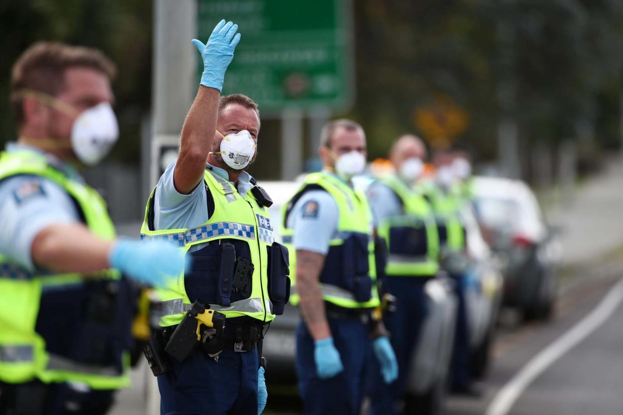 Police stop vehicles to heading north on state highway one at Warkworth in Auckland, New Zealand in April, during the coronavirus pandemic: Getty Images