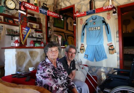 Jovan and Boja Subasic, father and mother of goalkeeper Danijel Subasic, are seen in Zagrad, Croatia, July 14, 2018. REUTERS/Antonio Bronic